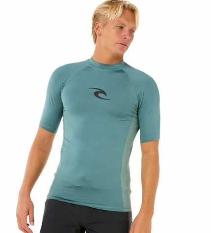 Rip Curl Waves UPF short-sleeve T-shirt in blue, sport and outdoor watersport shirt with rip and wave design.
