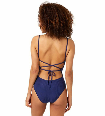 Rip Curl damesbadpak Modern Rib in marineblauw, sport en outdoor watersport wetsuit with ribbed fabric design.