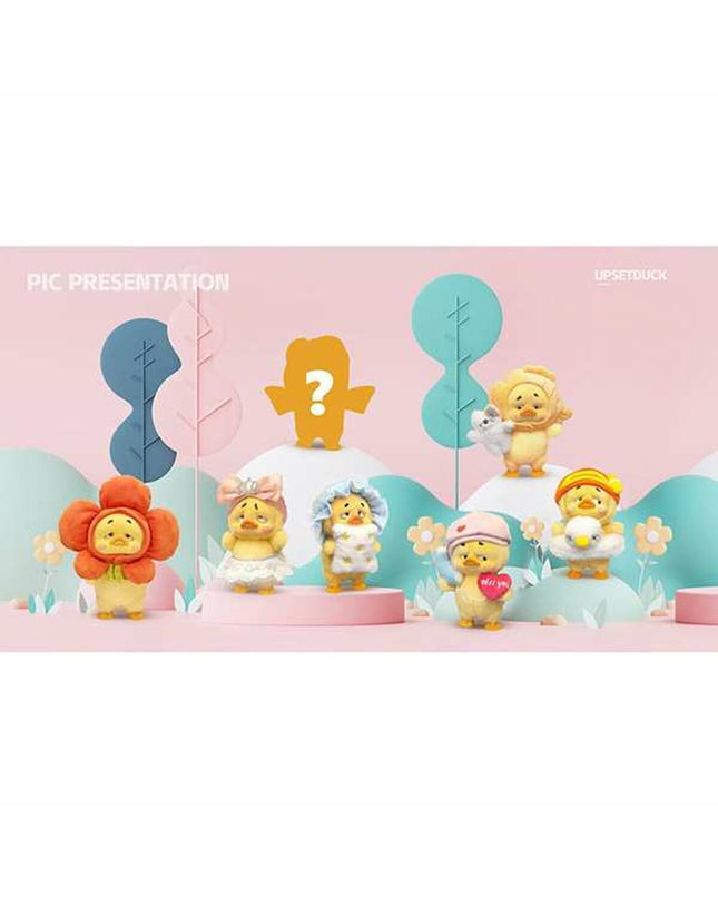 Soft plush Comansi Upsetduck Eend toy, 15 cm, featuring yellow duck design, suitable for children and plush toy collection