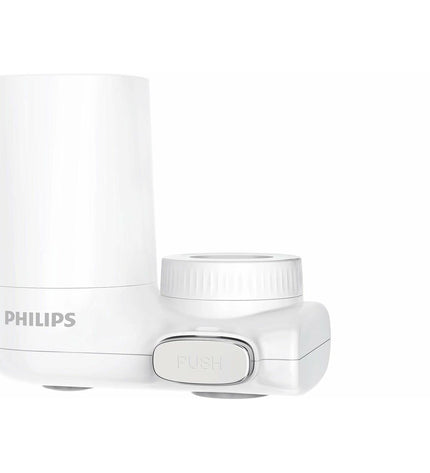 Philips AWP3703 faucet filter for kitchen use, shown attached to a tap, filtering water for household kitchen needs.