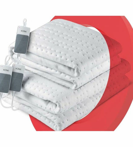 Solac CT8627 electric blanket with 120W in white, displayed folded on a bed, for warmth and personal comfort.