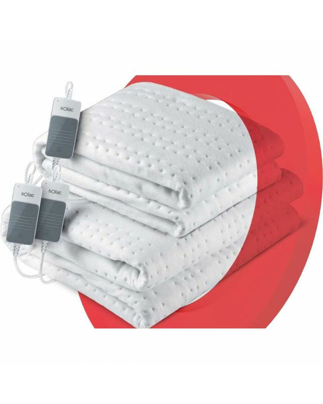 Solac CT8627 electric blanket with 120W in white, displayed folded on a bed, for warmth and personal comfort.