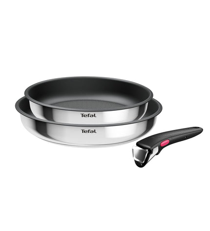 Tefal L8813S75 cookware set with non-stick pans, including frying and saucepans, arranged on a kitchen countertop.
