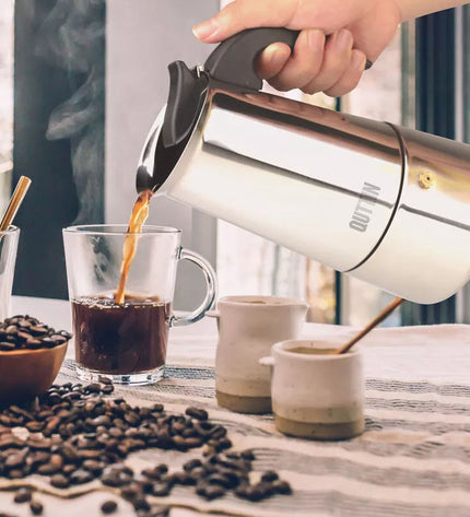 Set of nine Quttin Italian coffee pots for 6 cups, ideal for brewing traditional Italian espresso in the kitchen.
