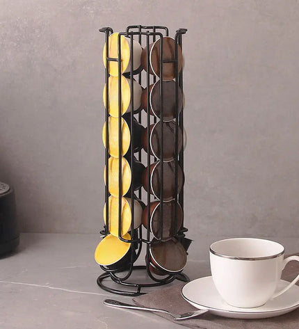 Quttin black iron coffee capsule organizer with 12 slots, measuring 11.5x33 cm, for storing coffee capsules and tea bags.