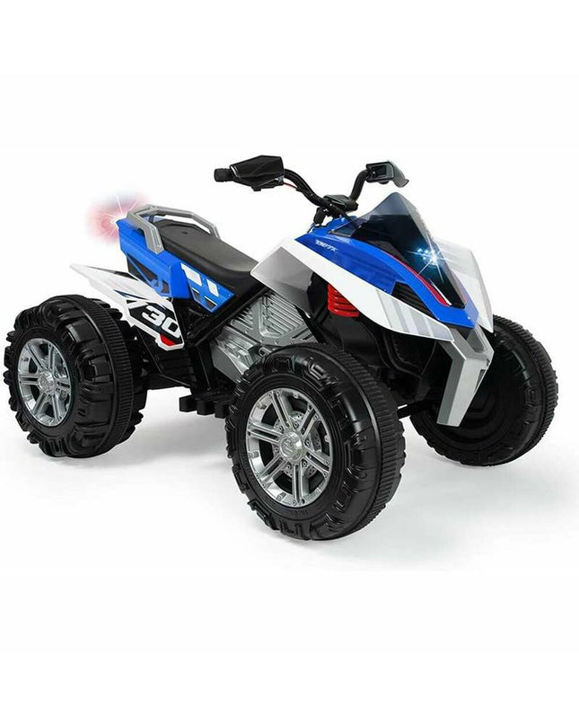 Blue and white Injusa Rage 12V electric quad toy with lights, designed for outdoor play and sports activities.