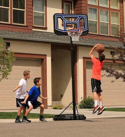 Lifetime basketball in outdoor sports setting, showing the basketball with brand logo and textured surface for outdoor play.