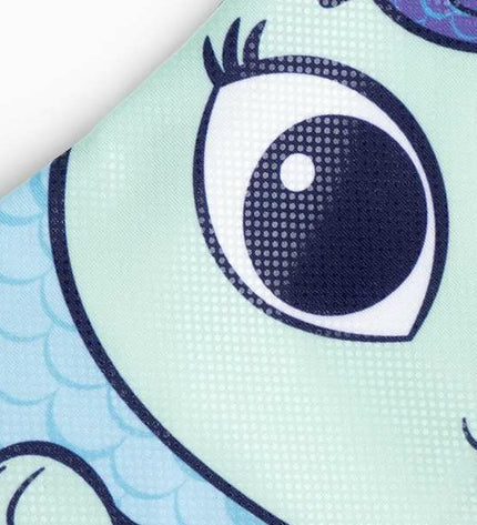 Gabby's Dollhouse girls' swimsuit for ages 6, featuring colorful design, ideal for water sports and outdoor swimming activities.