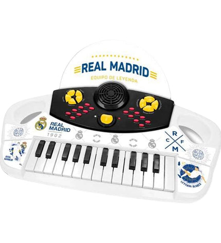 Colorful Real Madrid C.F. toy piano for children featuring team logo and keys, perfect for musical play and learning.