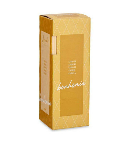 Set of six Acorde Amber parfum sticks in 250 ml containers, used for home decor and enhancing ambient scent.