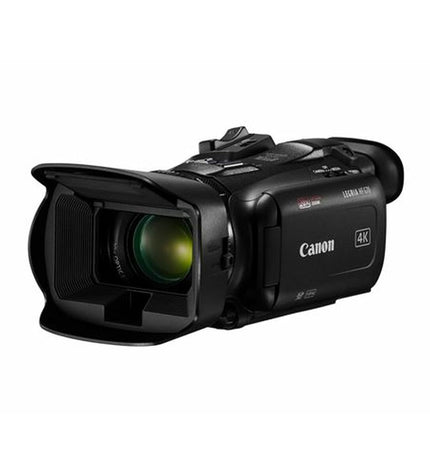 Canon videocamera 5734C006 with lens, buttons, and grip visible, designed for photography and videography in electronics.