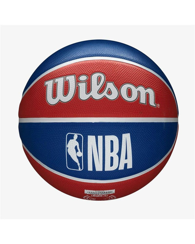 Wilson NBA Team Tribute basketball in blue with natural rubber surface, designed for outdoor sport and basketball gameplay.