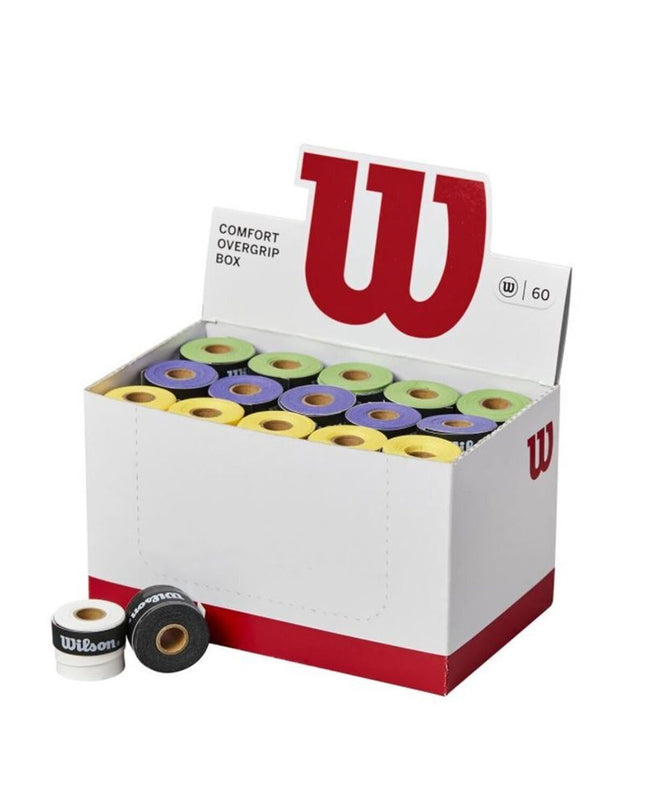 Wilson Comfort overgrip for paddle tennis in sports and outdoor use, showing a white grip with textured surface and Wilson branding.