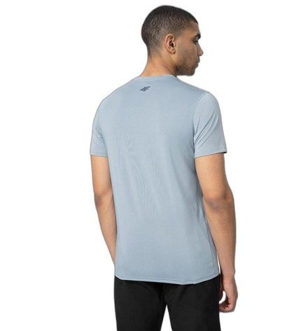 Light blue 4F short-sleeve T-shirt ideal for sports, outdoor activities, camping, and hiking, shown on a hanger.