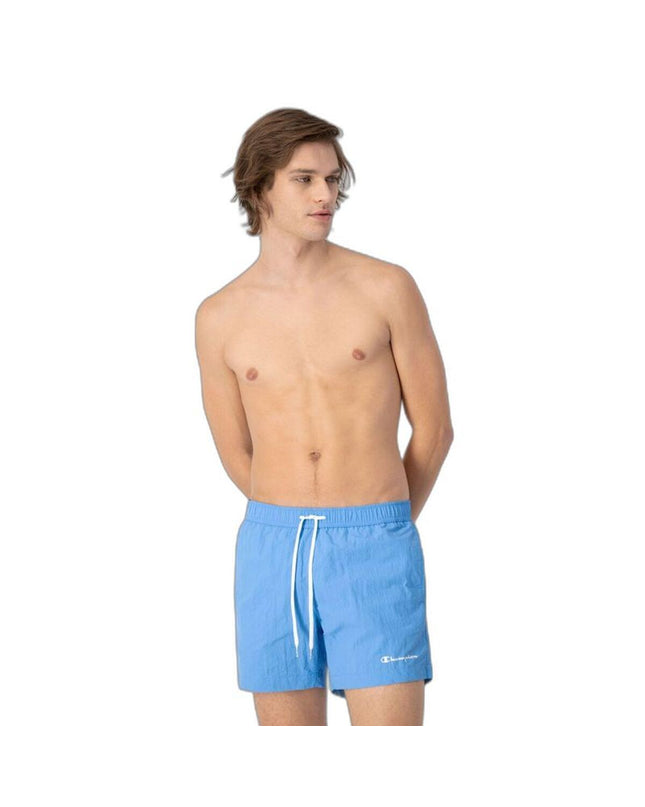 Champion men's swim trunks in blue with black accents, suitable for water sports and outdoor activities.
