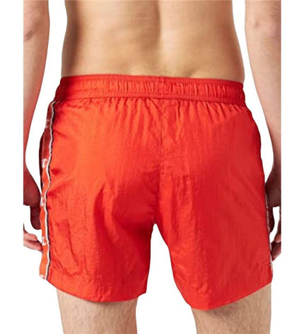 Red men's Champion swim shorts for sport and outdoor watersport activities, featuring a comfortable fit and quick-drying fabric.