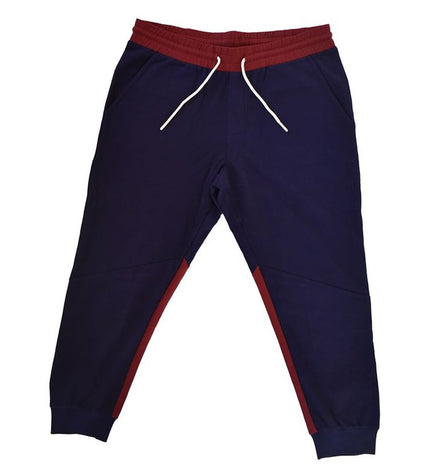 F.C. Barcelona adult blue football training pants, sporty outdoor soccer apparel for men, with F.C. Barcelona branding.