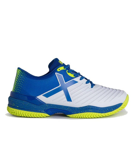 Kids' Munich Padelschoenen voor kinderen in blauw, sport en outdoor tennis shoes with cushioned soles and sporty design.