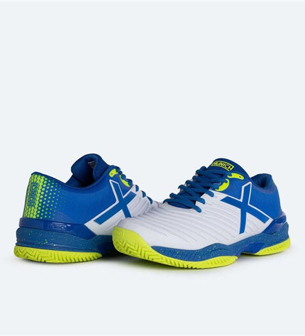 Blue Munich PADX kids' tennis shoes for outdoor sports, featuring sporty design and comfortable fit.
