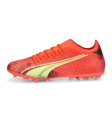 Orange Puma Ultra Match MG adult football cleats for outdoor soccer, showcasing the sporty design and grip features.