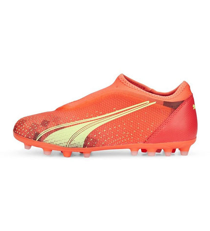 Puma Ultra Match LL MG orange football shoes for kids, designed for outdoor soccer, with a lightweight, supportive sole.