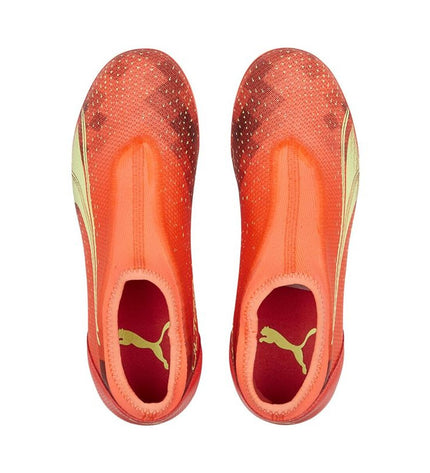 Puma Ultra Match LL MG orange soccer cleats for kids, designed for outdoor football with lightweight, durable outsole and vibrant color.