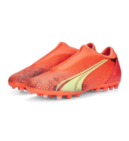 Orange Puma Ultra Match LL MG soccer cleats for kids, with black accents and textured outsole, designed for outdoor football play.