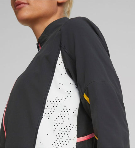 Black Puma Sportjack for women, outdoor sportswear with a fitted design and Puma logo on the front.