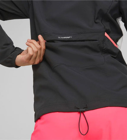 Black Puma women's sport jacket, lightweight outdoor sportswear with zipper and sporty fit, suitable for active outdoor activities.
