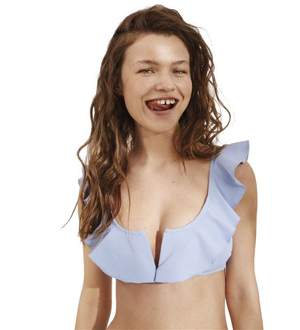 Light blue Ysabel Mora bikini for sport and watersports, featuring a fitted design suitable for active outdoor water activities.