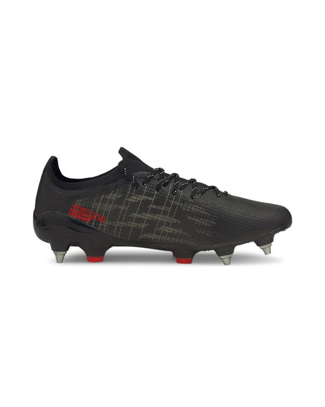 Black Puma Ultra 1.3 MxSG adult football shoes for outdoor sports, featuring a sleek design and durable outsole.