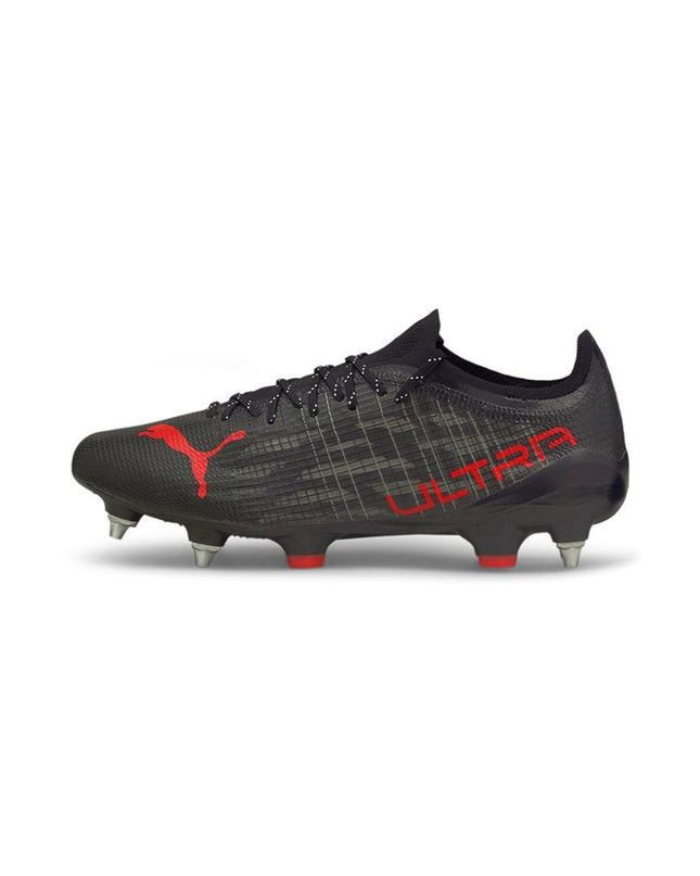 Black Puma Ultra 1.3 MxSG adult football cleats for outdoor soccer, featuring a sleek design and studded outsole for grip.