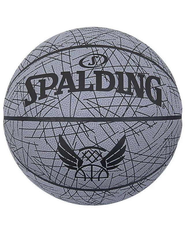Spalding 84570Z 7 basketball for outdoor sports, showing the textured orange surface and black branding details.