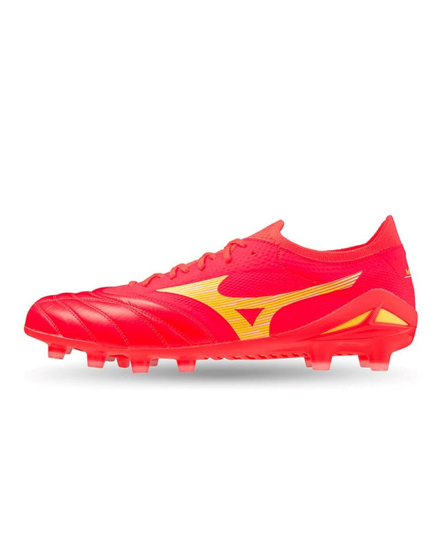 Mizuno adult soccer cleats for outdoor football, black and white design, close-up shot of the sports footwear.