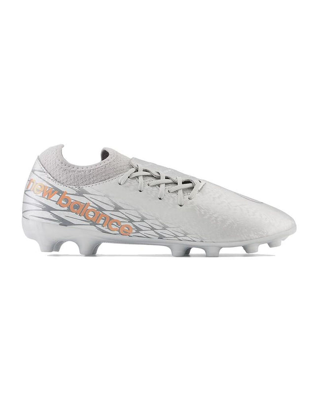 Gray New Balance Furon v7 Dispatch AG adult soccer cleats with textured upper and studded outsole for outdoor football.