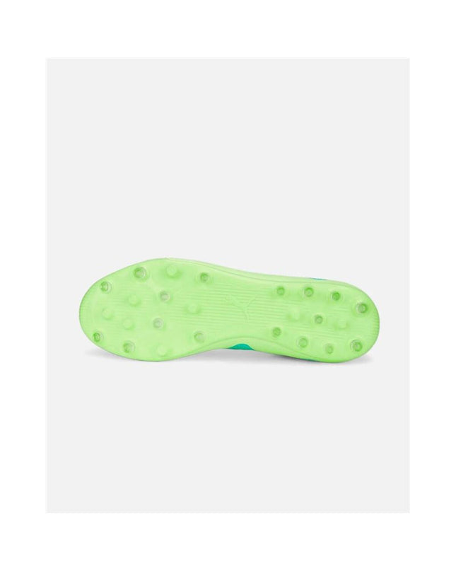 Puma Future Play Mg kids' lime green soccer shoes with black accents, designed for outdoor football, on a plain background.