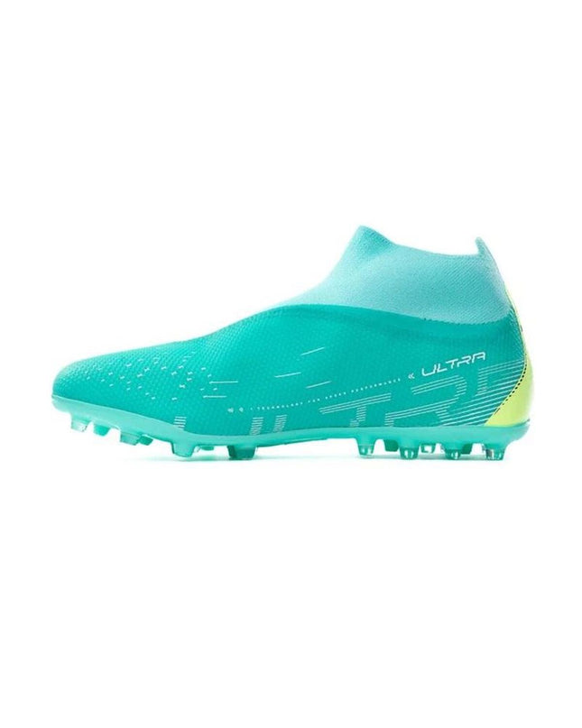 Puma adult aqua blue soccer cleats for outdoor football, featuring durable design and sport-specific traction.