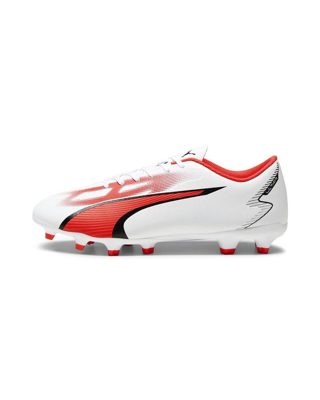 Adult Puma soccer cleats for outdoor football, showing black and white design with studded sole for grip.