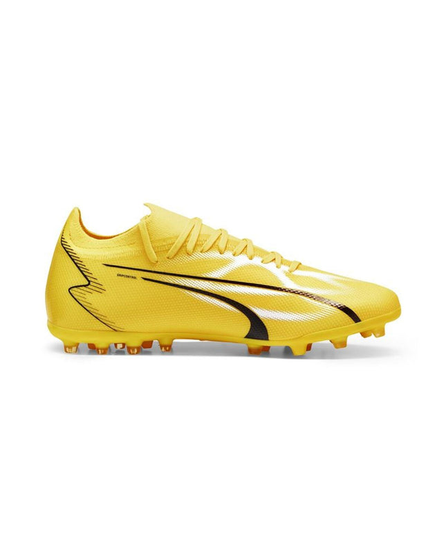 Yellow Puma Ultra Match Mg adult football shoes for outdoor soccer, featuring secure lacing and lightweight design.