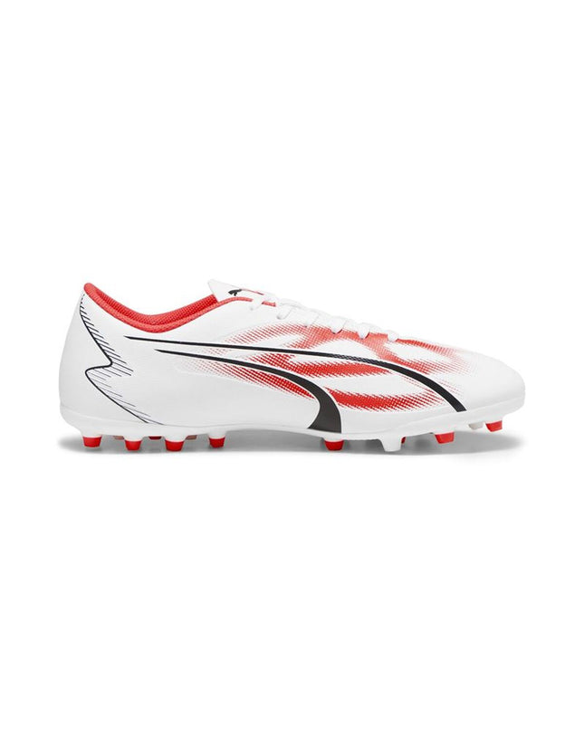 Adult Puma soccer cleats for outdoor football, featuring black and white design with Puma branding and textured sole.