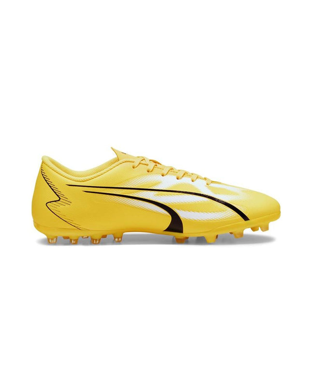 Yellow Puma Ultra Play MG adult football shoes for outdoor sports, designed for optimal grip and performance on the field.