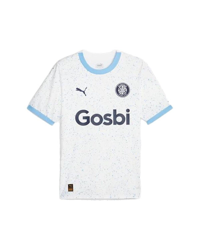 Puma soccer jersey 773526 02 in size M, sporty football shirt with Puma logo, white with blue accents, displayed on a hanger.