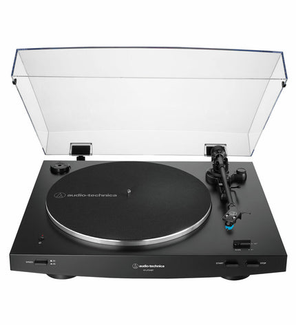 Audio-Technica Iberia AT-LP3BTBK black turntable with tonearm and built-in speakers, showcasing its sleek electronic design.