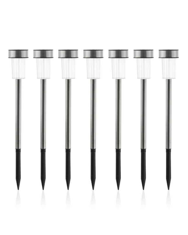 Set of seven Progarden Oh My Home Torch Garden Solar Lamps for outdoor garden decoration, with black metal posts and glowing torches