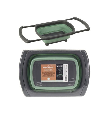 Redcliffs foldable camping sink set up outdoors, showing red portable sink for camping and outdoor activities.