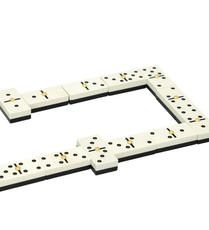 Set of six CB Games dominoes, featuring classic black and white tiles for fun and strategic gameplay.