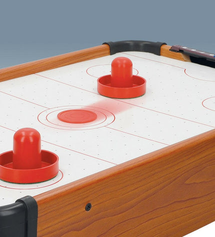 Pair of CB Games hockey tables in black and red with goal areas, designed for fun playing games.