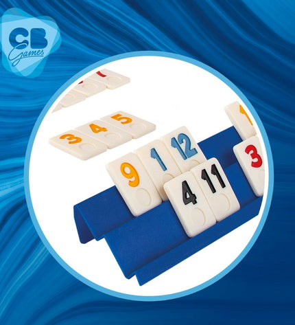 CB Games Rummi board game with 112 pieces, compact 24.5x3x6 cm, six sets of colorful tiles for fun family gameplay.