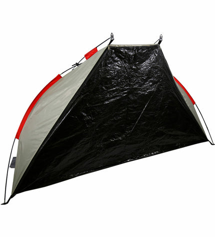 Aktive Windscherm for outdoor camping, measuring 200 x 90 x 100 cm, shown set up in a natural outdoor environment.