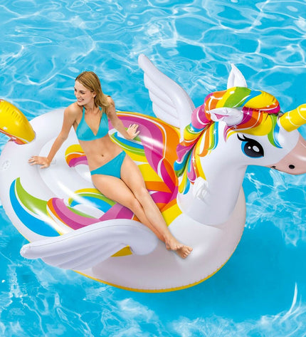 Two Intex inflatable unicorn islands for outdoor play, measuring 163x251x145 cm, featuring colorful unicorn designs.
